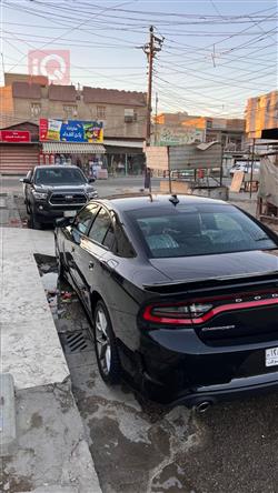 دۆج چارجەر